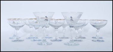 A collection of vintage Babycham advertising glasses to include three different styles to include