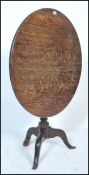 A 19th Century provincial oak circular pedestal ti