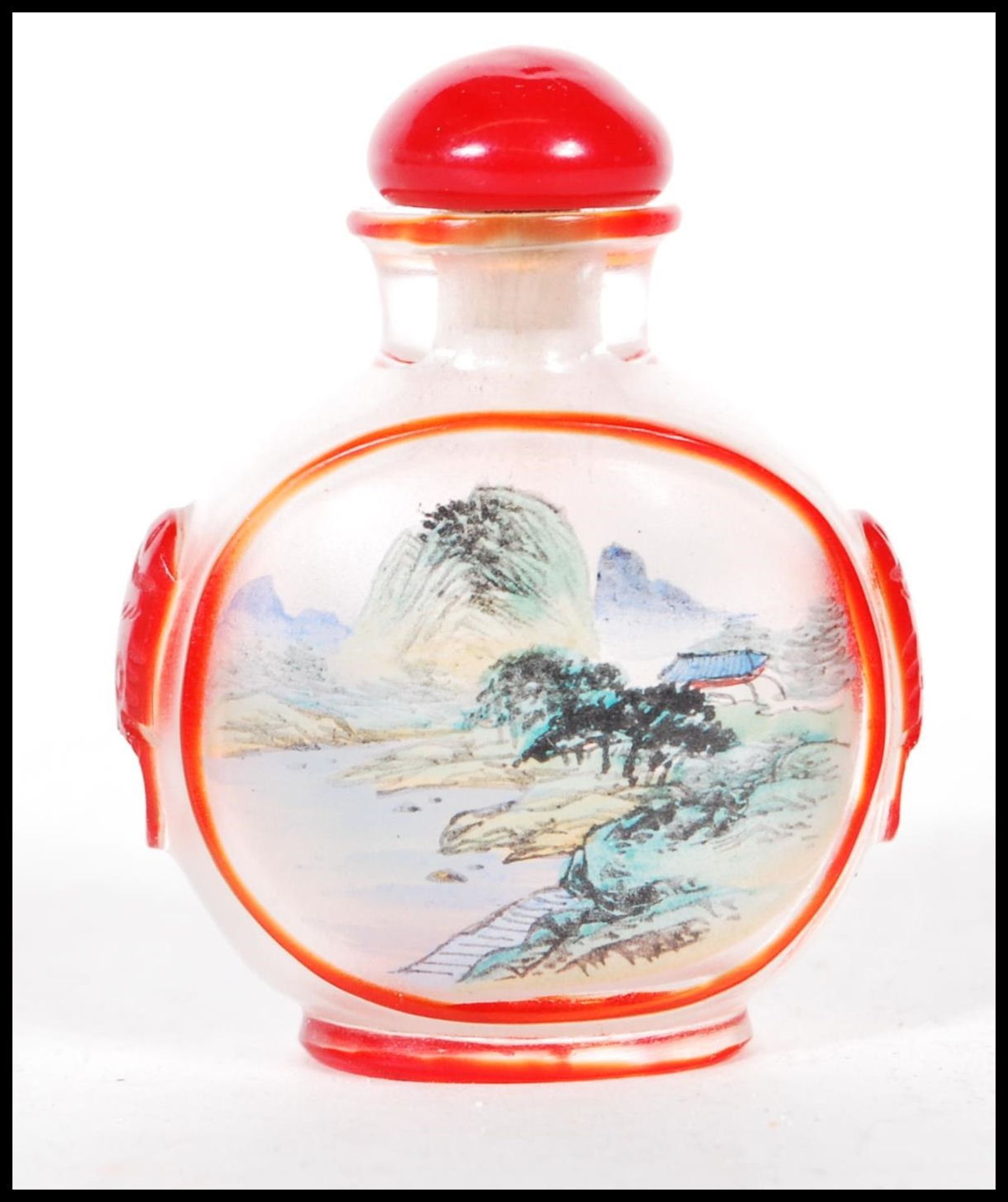 A late 19th Century Chinese glass perfume scent bottle of small proportions having the interior hand