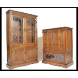 An Old Charm carved oak lead glaze Linen Fold  bookcase over cupboard base with linen fold