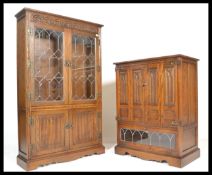An Old Charm carved oak lead glaze Linen Fold  bookcase over cupboard base with linen fold