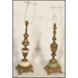 A near pair of Louis XVI style alabaster mounted gilt metal table lamps of bulbous form, each raised