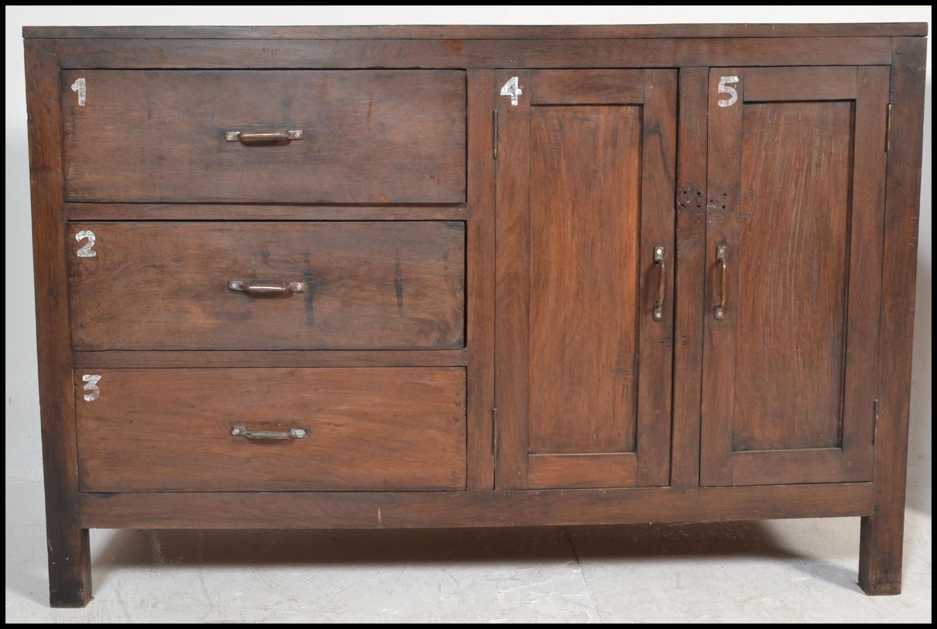 A pair of unusual 20th century hardwood sideboard cabinets of hardwood construction being raised - Bild 4 aus 17