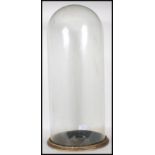 A large 19th century Victorian antique glass taxidermy / clock dome being of cylindrical form set on