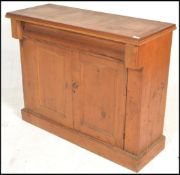 A 19th Century Victorian stripped pine sideboard chiffonier, single frieze drawer over panel