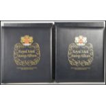 Royal Mail Luxury GB Queen Elizabeth hingeless stamp albums (2) in slip-in cases.Vol 1 1953-1970,