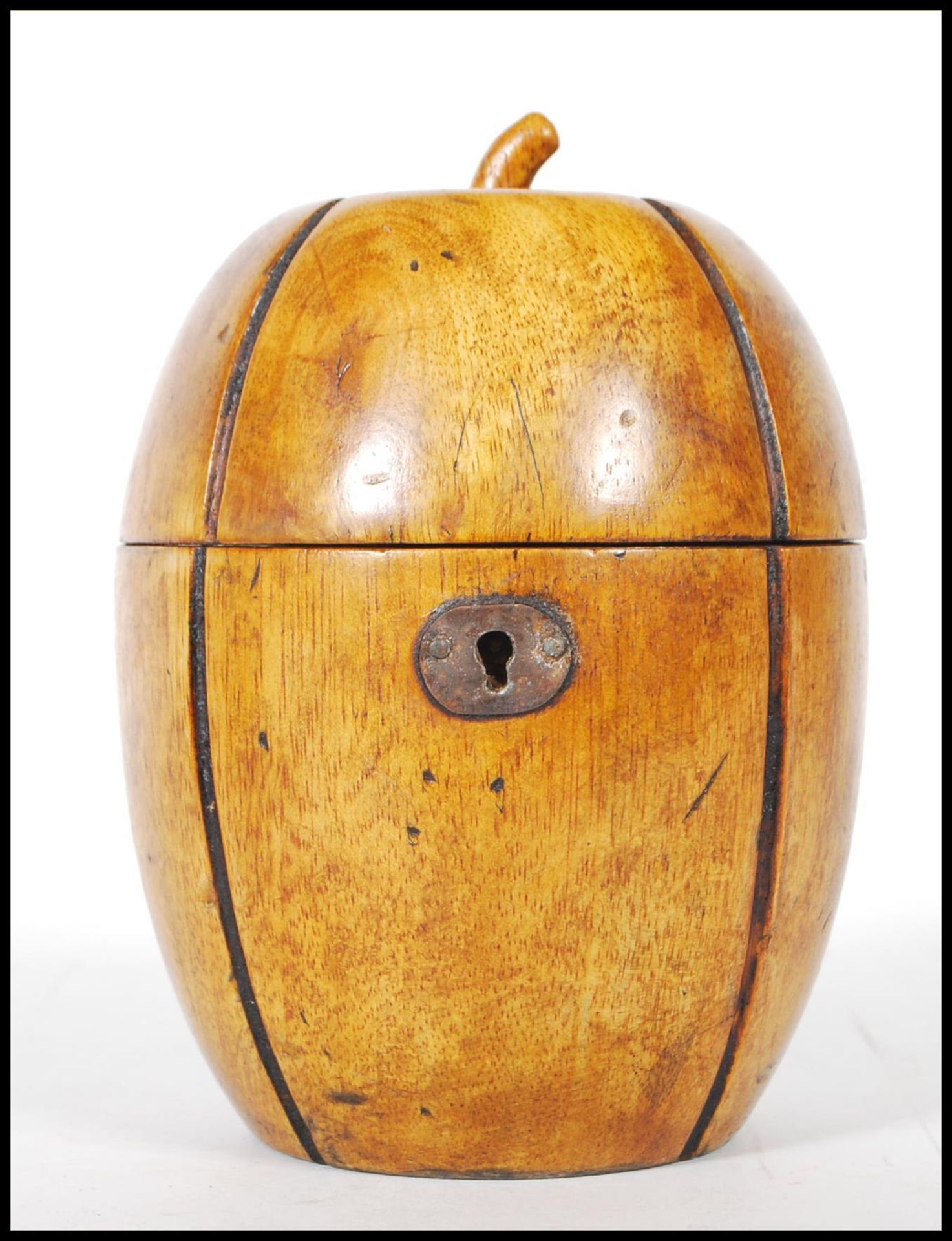 An 18th Century Georgian style fruitwood tea caddy in the form of a melon with lock and key to