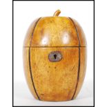 An 18th Century Georgian style fruitwood tea caddy in the form of a melon with lock and key to