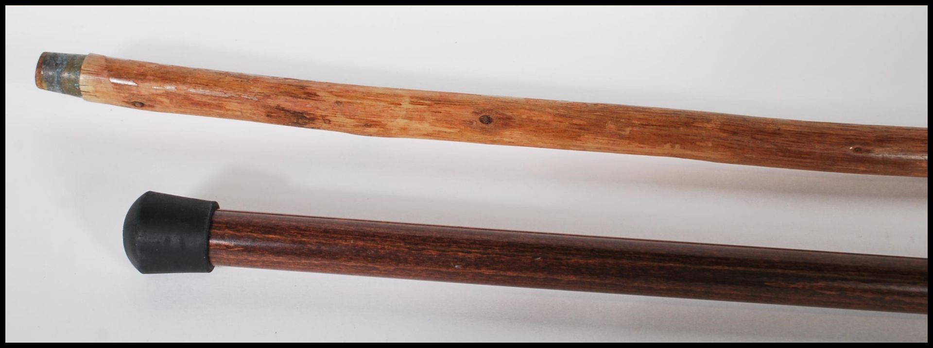 Two  20th Century walking stick canes to include a walking stick with a faux wooden handle in the - Bild 3 aus 5
