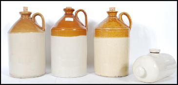 A selection of 19th Century stoneware brown glazed flagons to include one advertising bottle