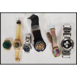 A collection of 20th Century wrist watches, predominately swatch watches together with gents dress