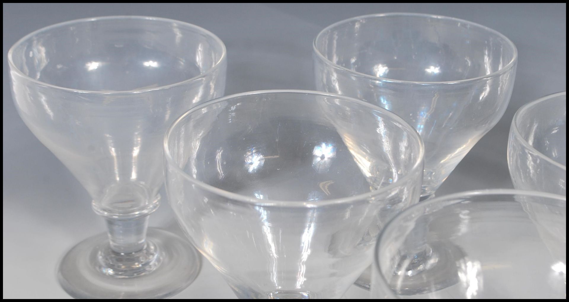 A group of six 19th Century Georgian rummer glasses having tapering bowls with capstan stems - Bild 9 aus 15