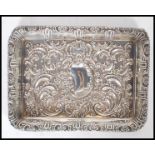 A George Lingard silver hallmarked dressing table tray of rectangular form having scrolled