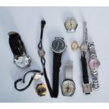 A collection of vintage 20th Century wrist watches wrist watches to include a Timex water