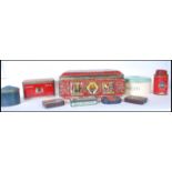 A collection of 20th Century vintage advertising tea and tobacco tins to include Lyons tea, Jacksons