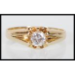 A hallmarked 9ct yellow gold oval single stone solitaire diamond ring having a central claw set