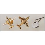 Two vintage 20th Century gold plated cufflinks in the form of military airplanes together with a