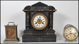 A collection of three clocks to include a late 19th Century Victorian Hamburg and America eight