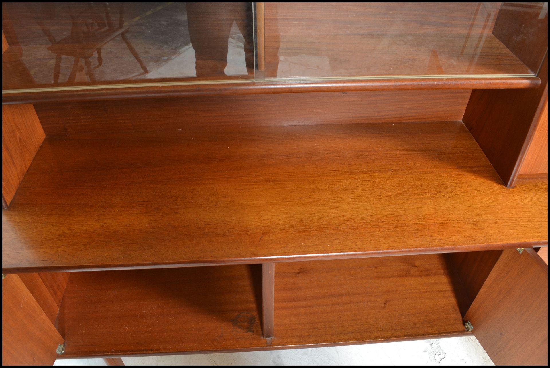 A retro 20th Century teak wood highboard sideboard credenza, being raised on square supports - Bild 6 aus 6