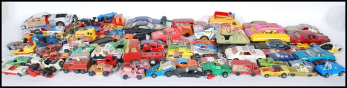 A COLLECTION OF DIECAST MODEL VEHICLES AND OTHERS