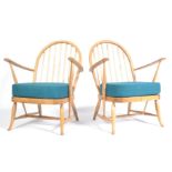 A PAIR OF ERCOL 1950'S LOW WINDSOR CHAIRS BY LUCIA