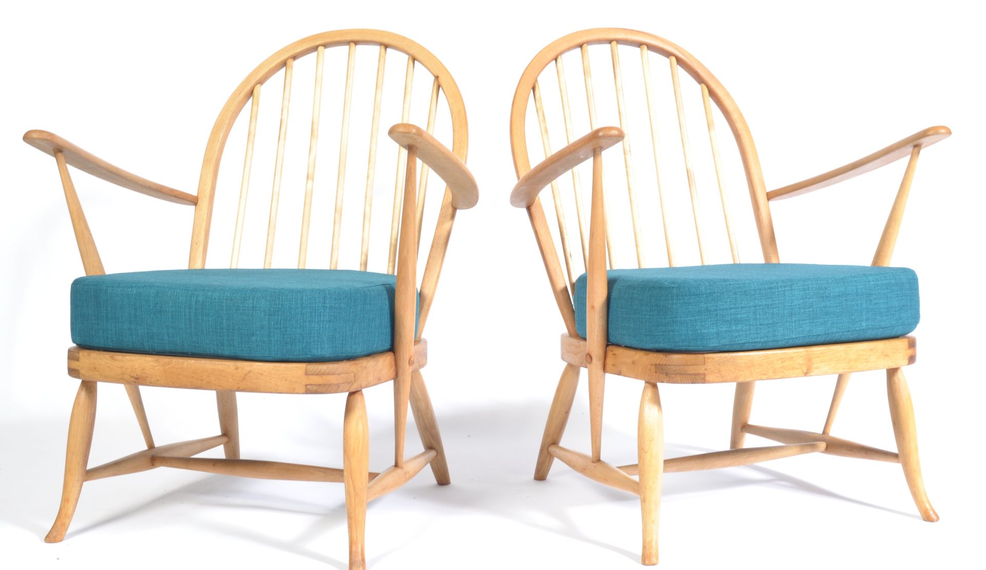 A PAIR OF ERCOL 1950'S LOW WINDSOR CHAIRS BY LUCIA