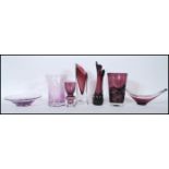 A collection of retro studio art amethyst glass vases and bowls to include a selection of