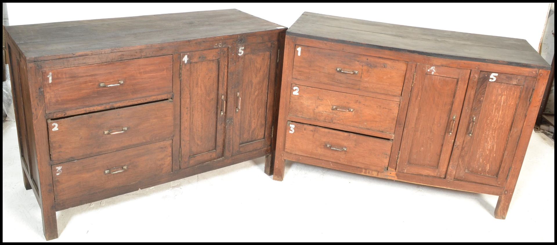 A pair of unusual 20th century hardwood sideboard cabinets of hardwood construction being raised - Bild 11 aus 17