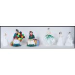 A collection of Royal Doulton ceramic figurines to include Harmony HN 4096, Joy HN 3875, Welcome