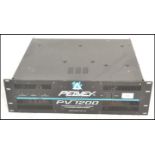 Musical Equipment. A Peavey PV1200 professional stereo power amplifier 600 Watts x 2.