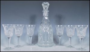 A 20th Century good quality cut glass bell decanter having cut starlike decoration throughout and