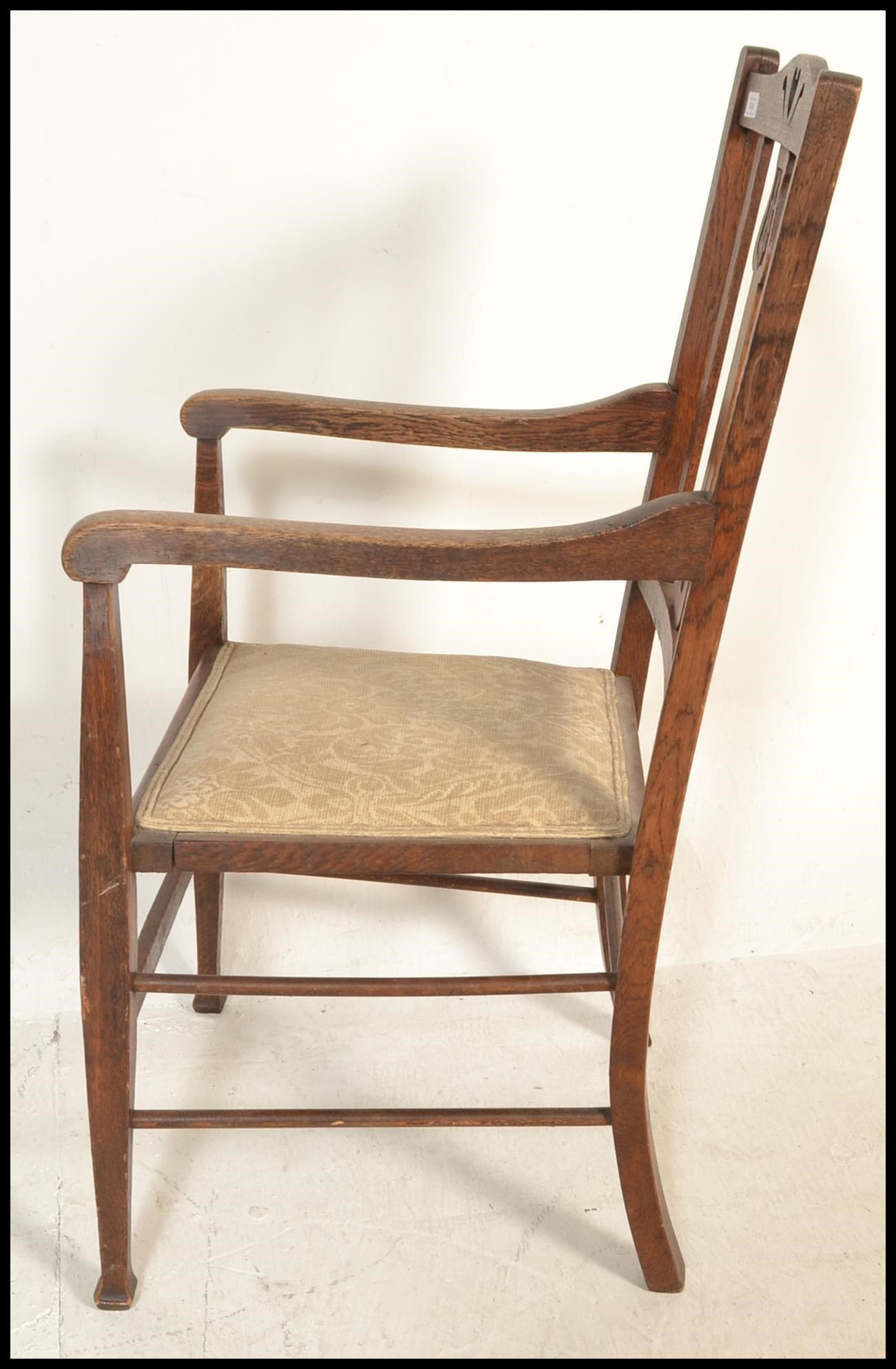 A late 19th / early 20th Century Art Nouveau oak elbow chair, pierced backrest over carved splatback - Image 5 of 5