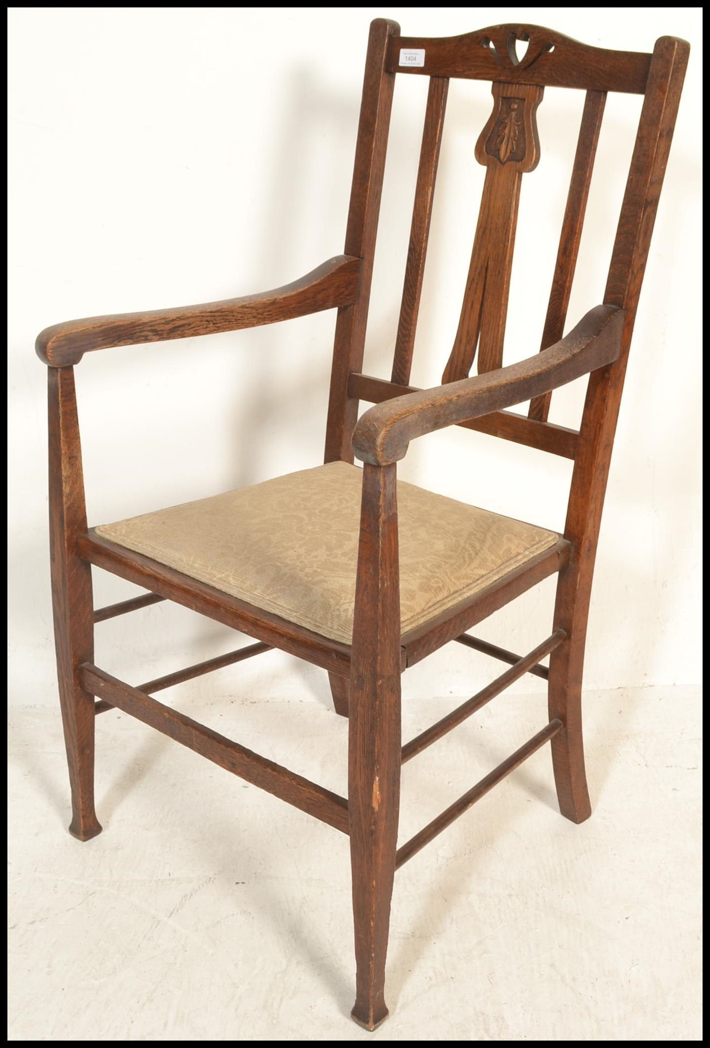 A late 19th / early 20th Century Art Nouveau oak elbow chair, pierced backrest over carved splatback - Image 4 of 5