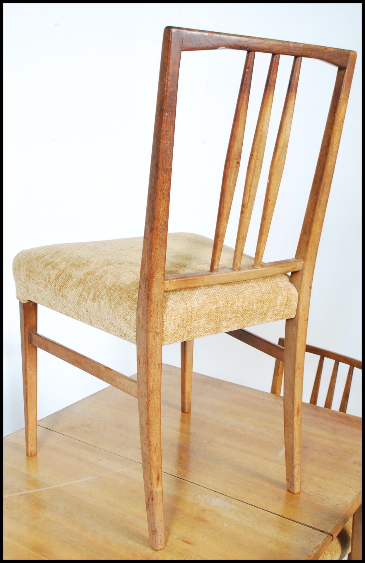 A mid 20th Century Gordon Russell walnut dining suite, comprising extending dining table, 79cm - Image 3 of 5