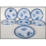 A matching set of seven early 20th Century blue and white dinner plates having blue pattern
