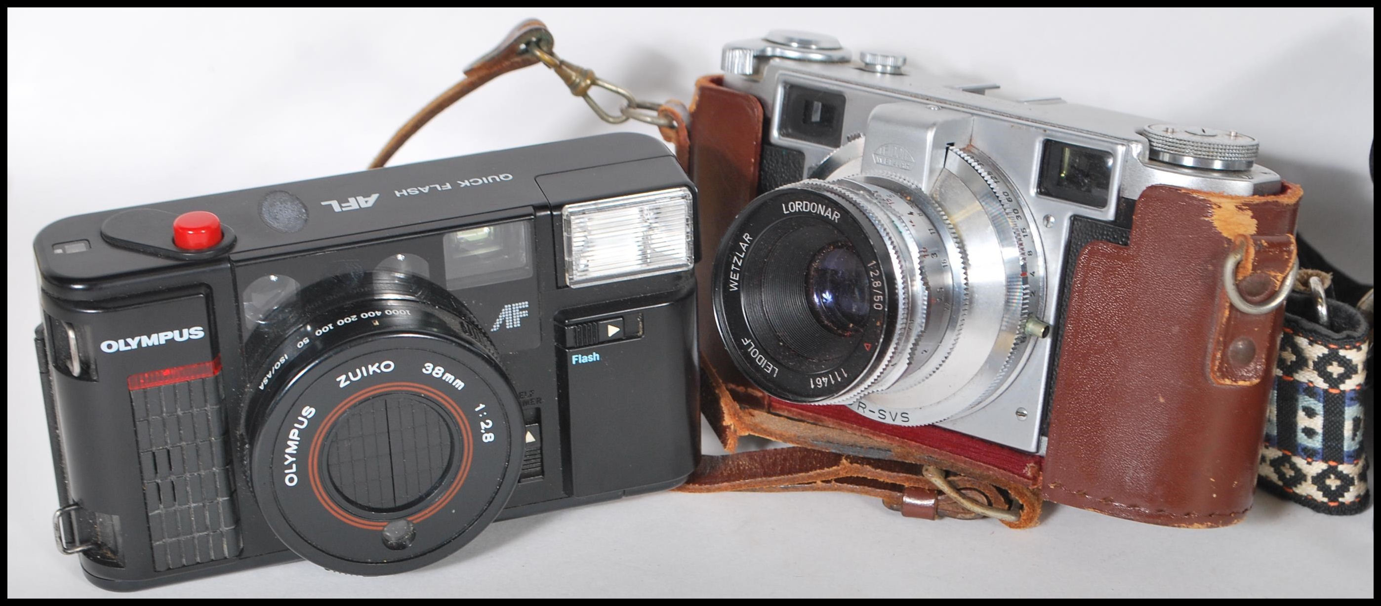 A collection of vintage film cameras to include a Praktica B100 film camera, an Olympus Quick - Image 2 of 8