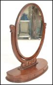 A 19th century large Victorian mahogany oval ladies dressing table vanity mirror with good lozenge