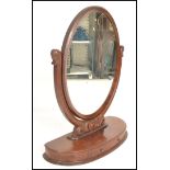 A 19th century large Victorian mahogany oval ladies dressing table vanity mirror with good lozenge