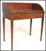 A 19th century George III mahogany writing table desk. Raised on squared legs with fitted frieze