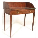 A 19th century George III mahogany writing table desk. Raised on squared legs with fitted frieze