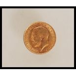 A 22ct gold 1913 half sovereign coin having a George V head facing left with George and the Dragon