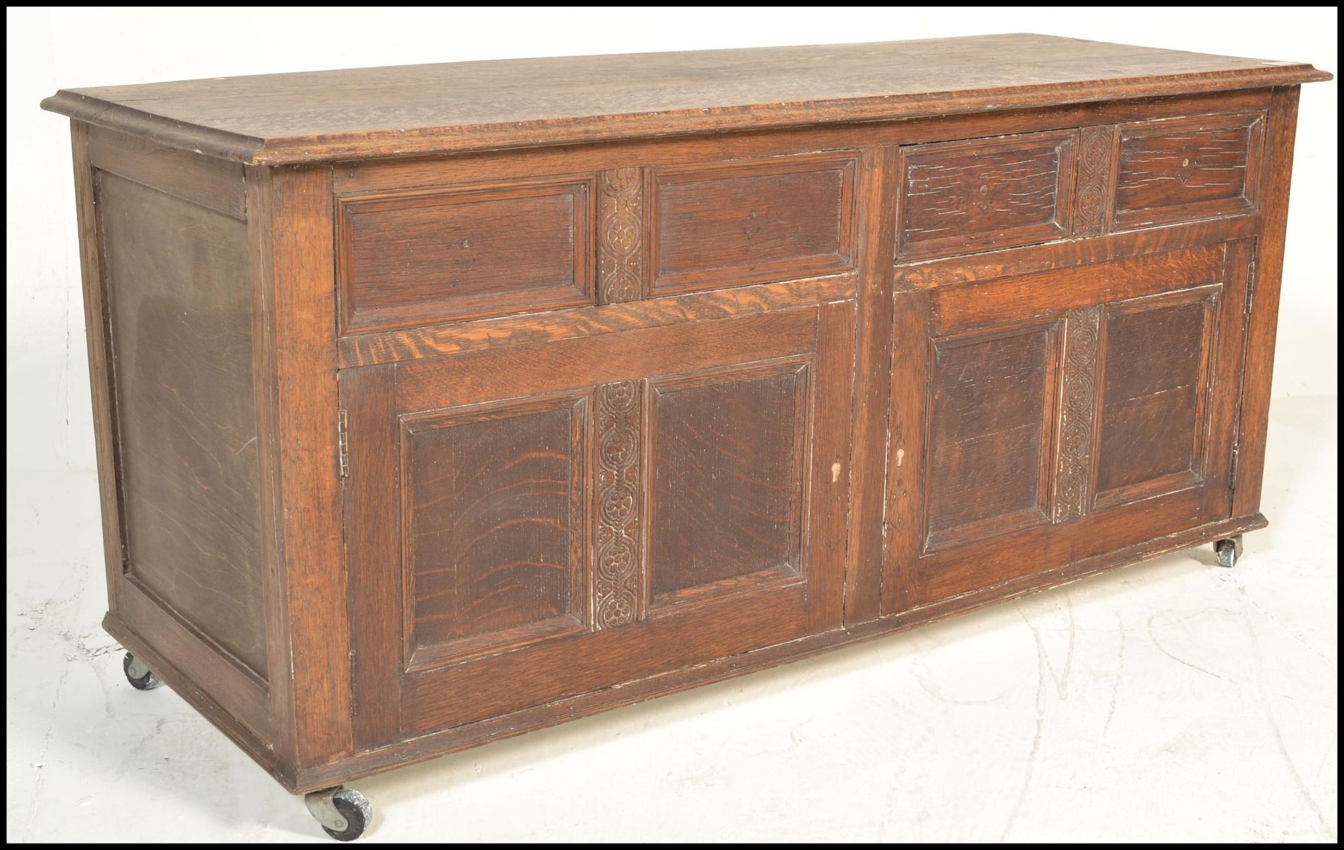 A 20th Century Jacobean revival panel oak coffer chest, panel sides and front with hinged top raised - Image 9 of 9