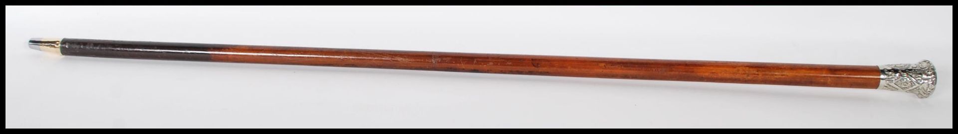 A 20th Century walking stick cane having a malacca shaft with silver knop to the top having repousse - Bild 2 aus 8