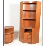 A retro 20th Century teak wood lounge three piece modular display cabinet by Nathan, comprising of