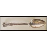 A 19th Century Victorian John & Henry Lias serving spoon having scrolled gadrooned detailing,