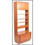 A mid century teak wood upright highboard cabinet / room divider of Danish influence comprising of