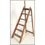 An early 20th Century pine and iron mounted ' Simplex Ladder ', with Self Acting Stop, Patent No.