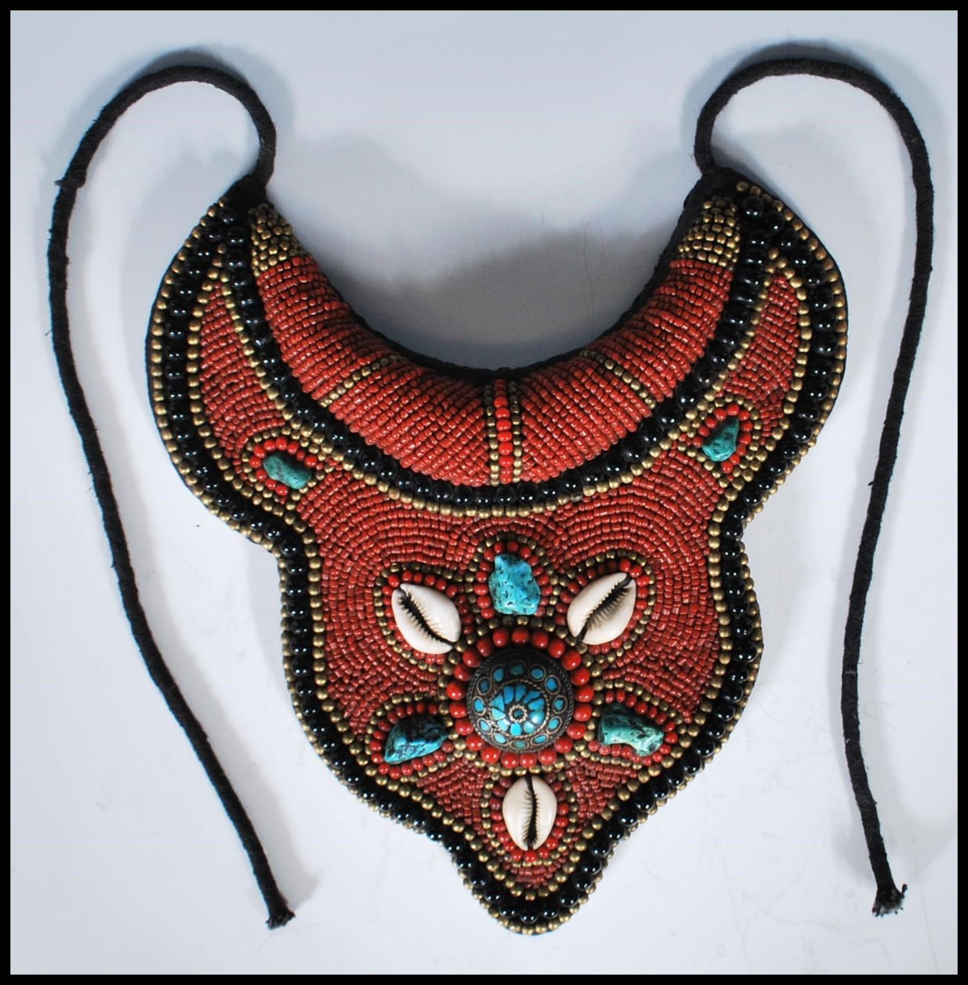 A 20th Century Tibetan tribal collar necklace constructed from a fabric panel stitched with red - Image 14 of 17