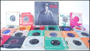 A collection of 1960's 7" vinyl singles together with a long play LP record by Mississippi John