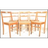A set of 6 mid 20th century beech wood school / village hall dining chairs. Each with beech wood